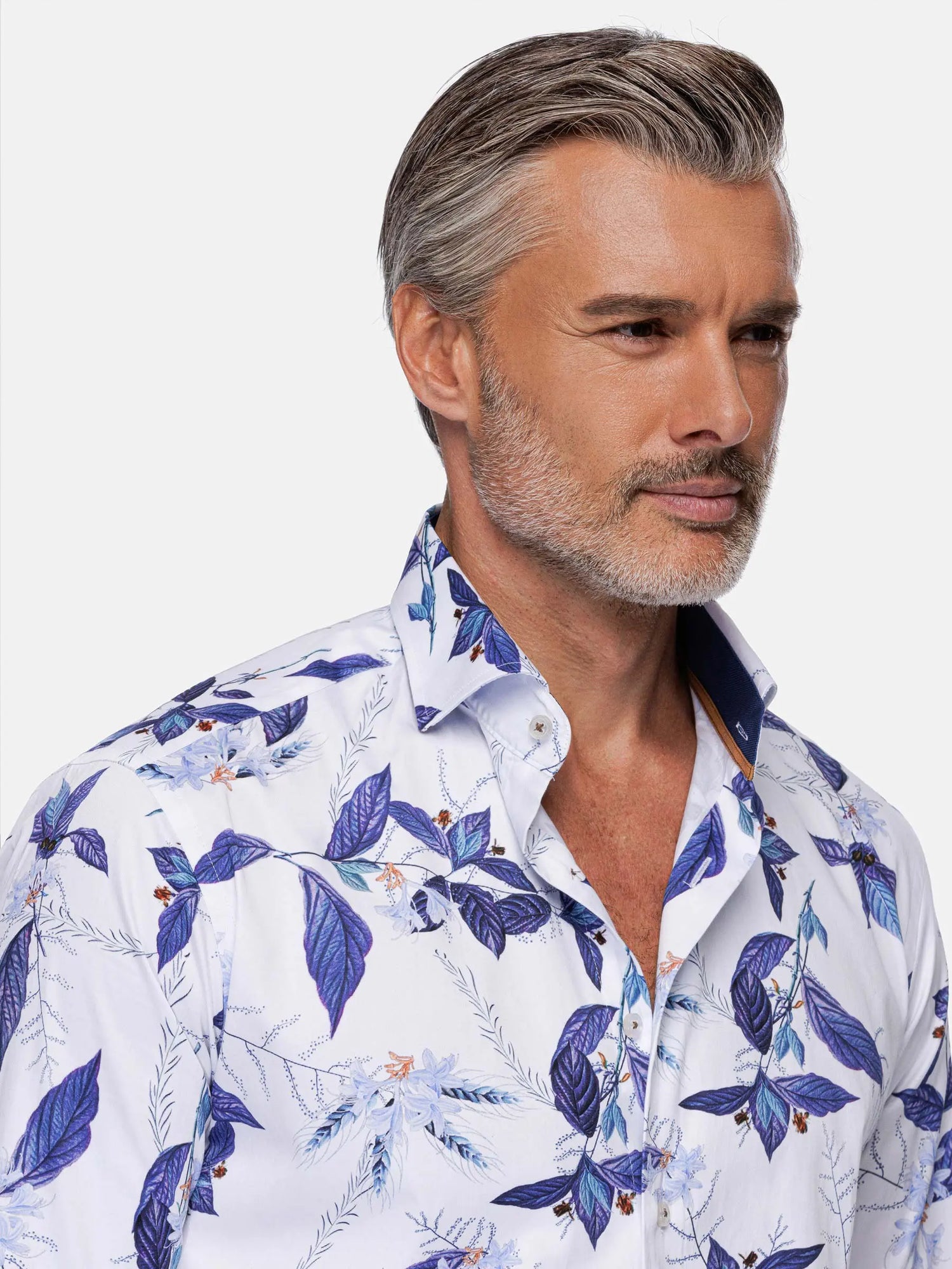 Man wearing white and blue floral print dress shirt with contrast collar detail – Wam Denim.