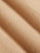 Close-up of beige fabric with subtle texture, ideal for clothing. – Wam Denim.