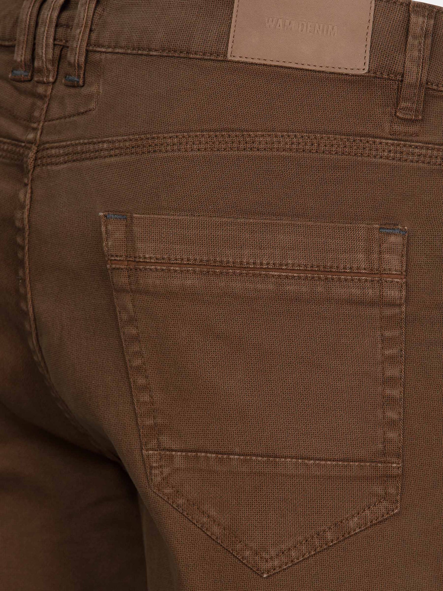 Close-up of black jeans with stylish pocket design. – Wam Denim.