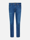 Light blue slim-fit jeans with slight fade and classic pocket design – Wam Denim.