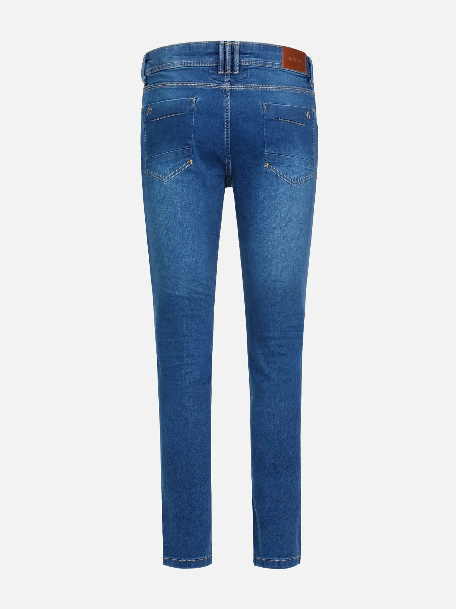 Back view of light blue slim-fit jeans with stitched pockets and leather label – Wam Denim.