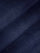Close-up of dark navy denim fabric texture showing smooth weave and slight fade – Wam Denim.