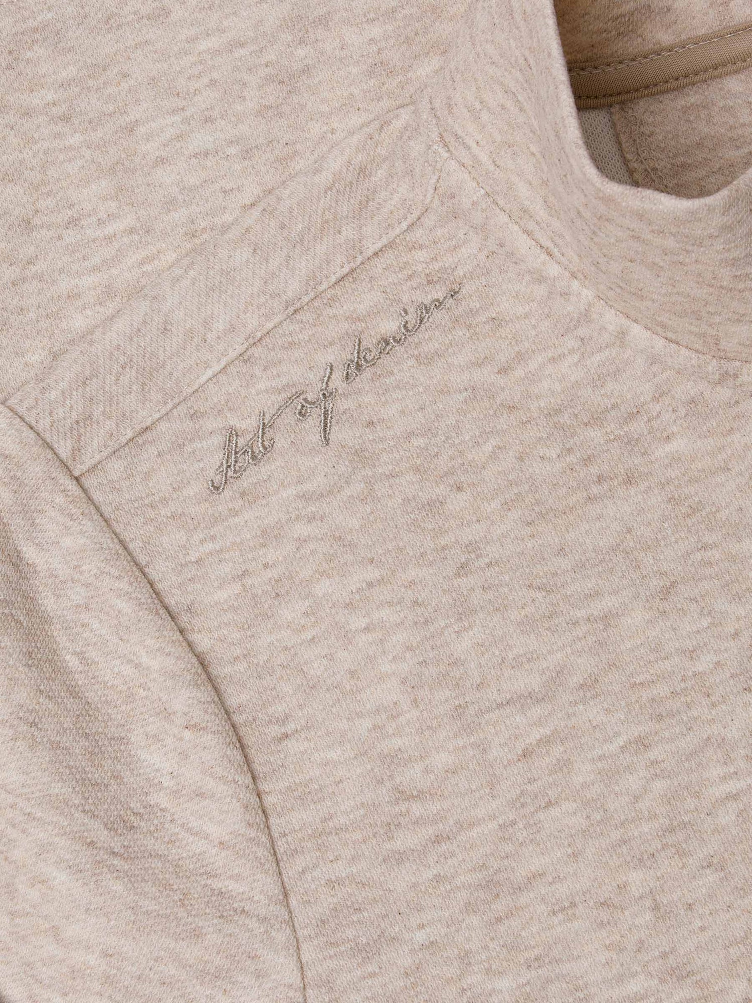 Beige sweatshirt with 'All of the Above' embroidery on a beige background
