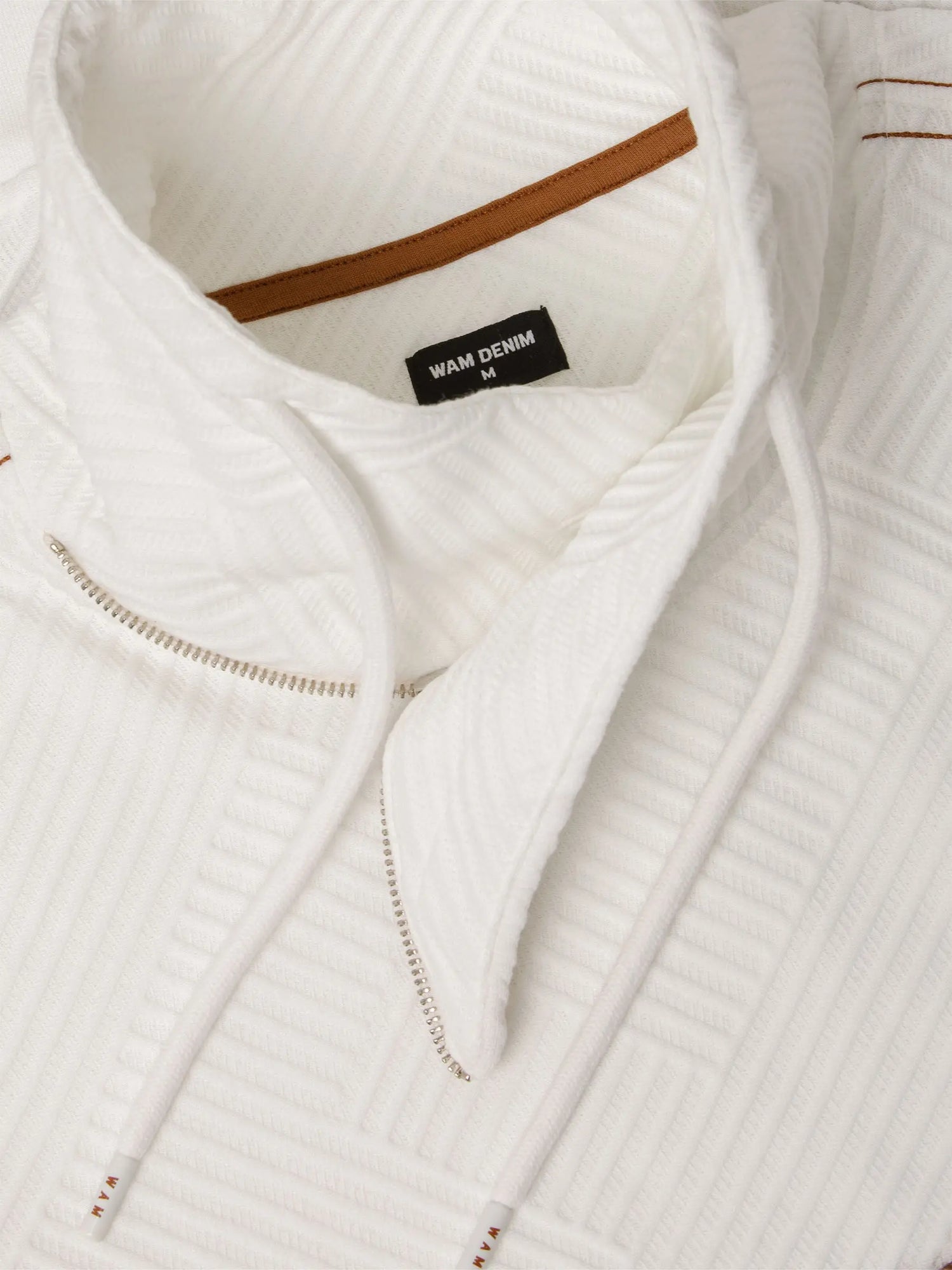 Close-up of white textured turtleneck sweatshirt with drawstrings and Wam Denim label – Wam Denim.