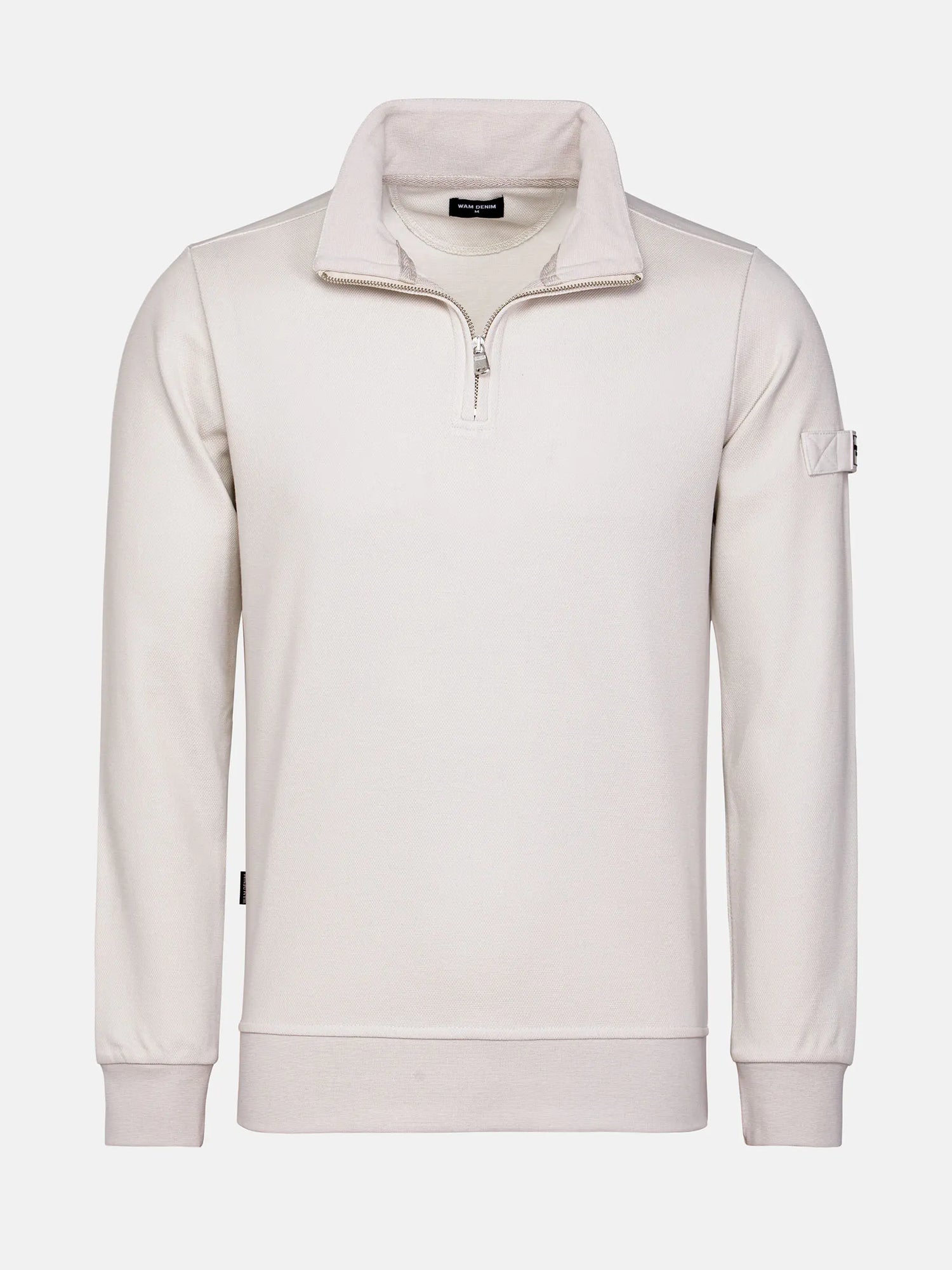 Close-up of light beige Milburn Sweater with stitching. – Wam Denim.