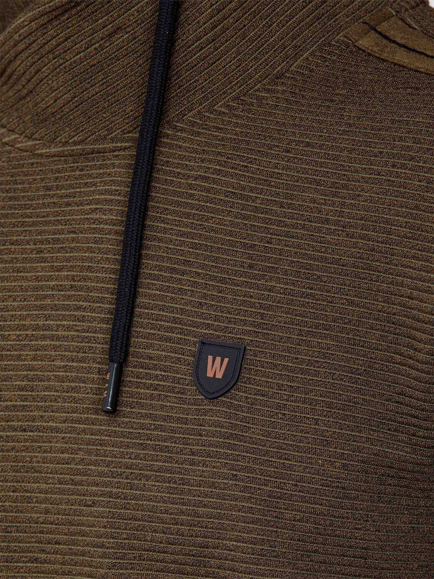 Close-up of the W-shield logo and drawstring on the sweater – Wam Denim.