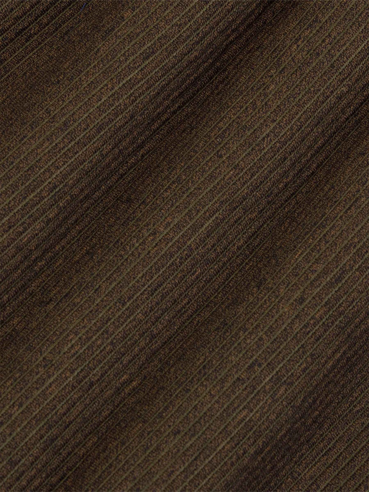 Close-up texture of diagonally ribbed knit fabric – Wam Denim.