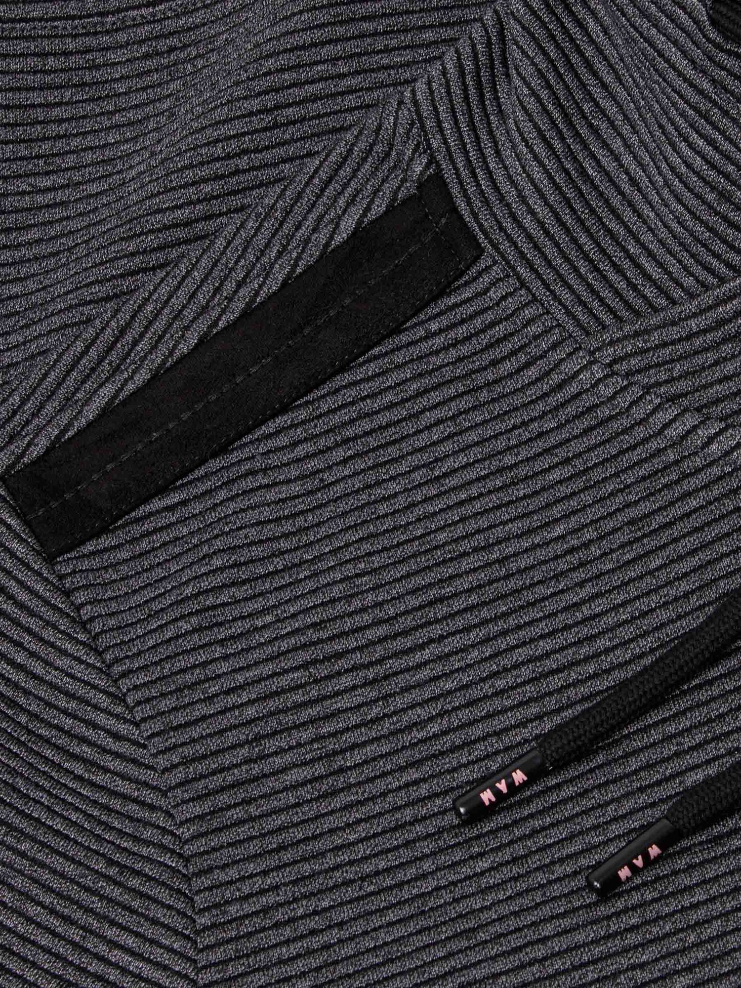 Detailed close-up of ribbed Anthracite fabric with drawstring ends and stitched trim – Wam Denim.