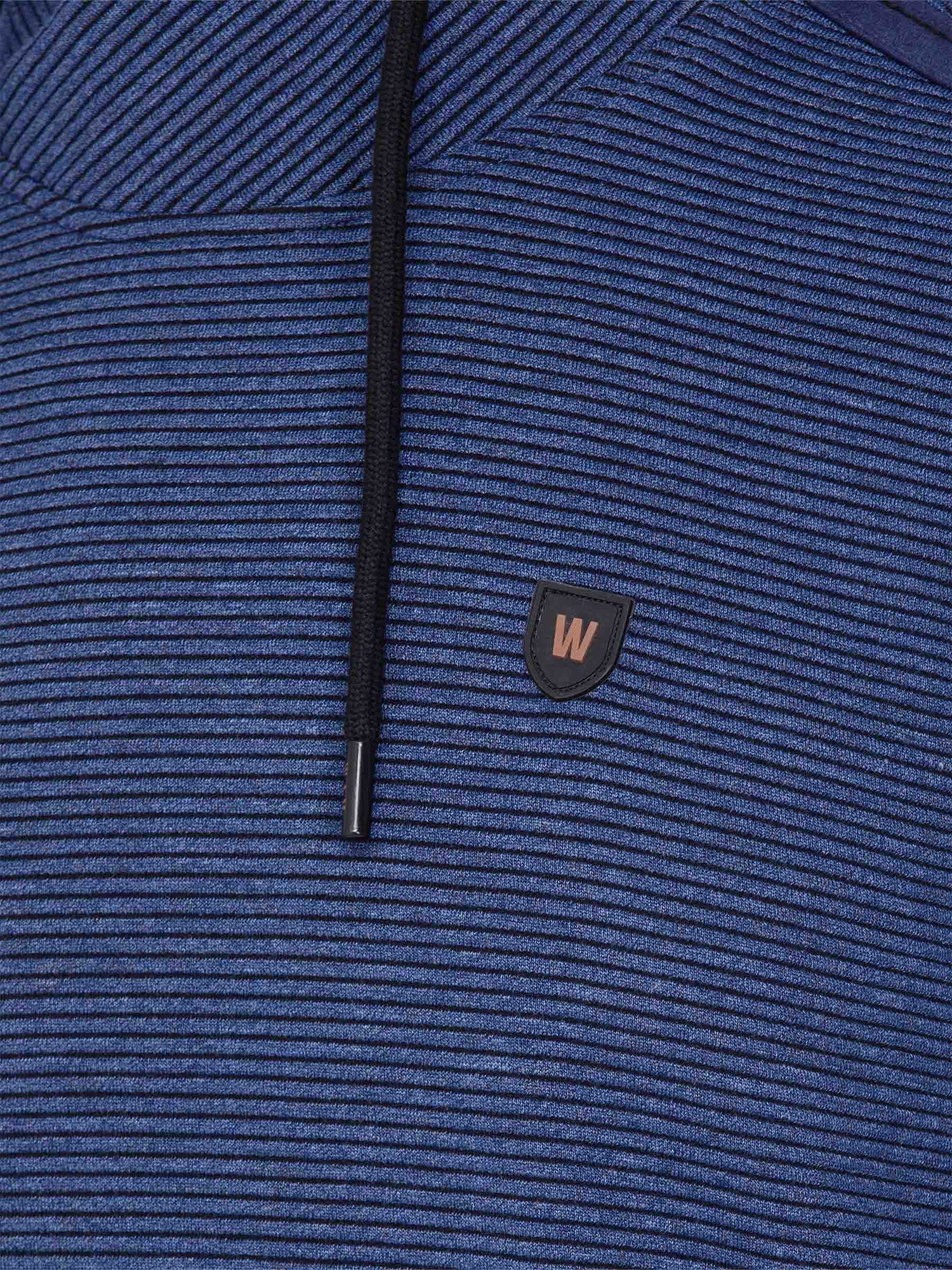 Close-up of the W-shield logo and drawstring on the blue stripe sweater – Wam Denim.