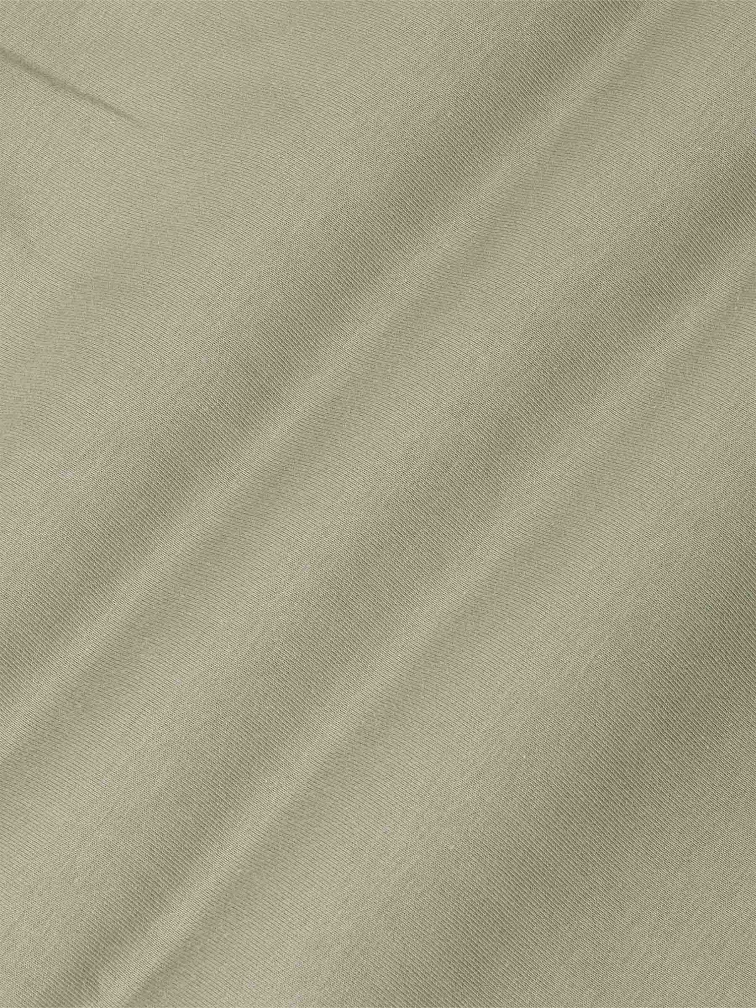 Close-up of Light Green Sweater fabric with subtle texture