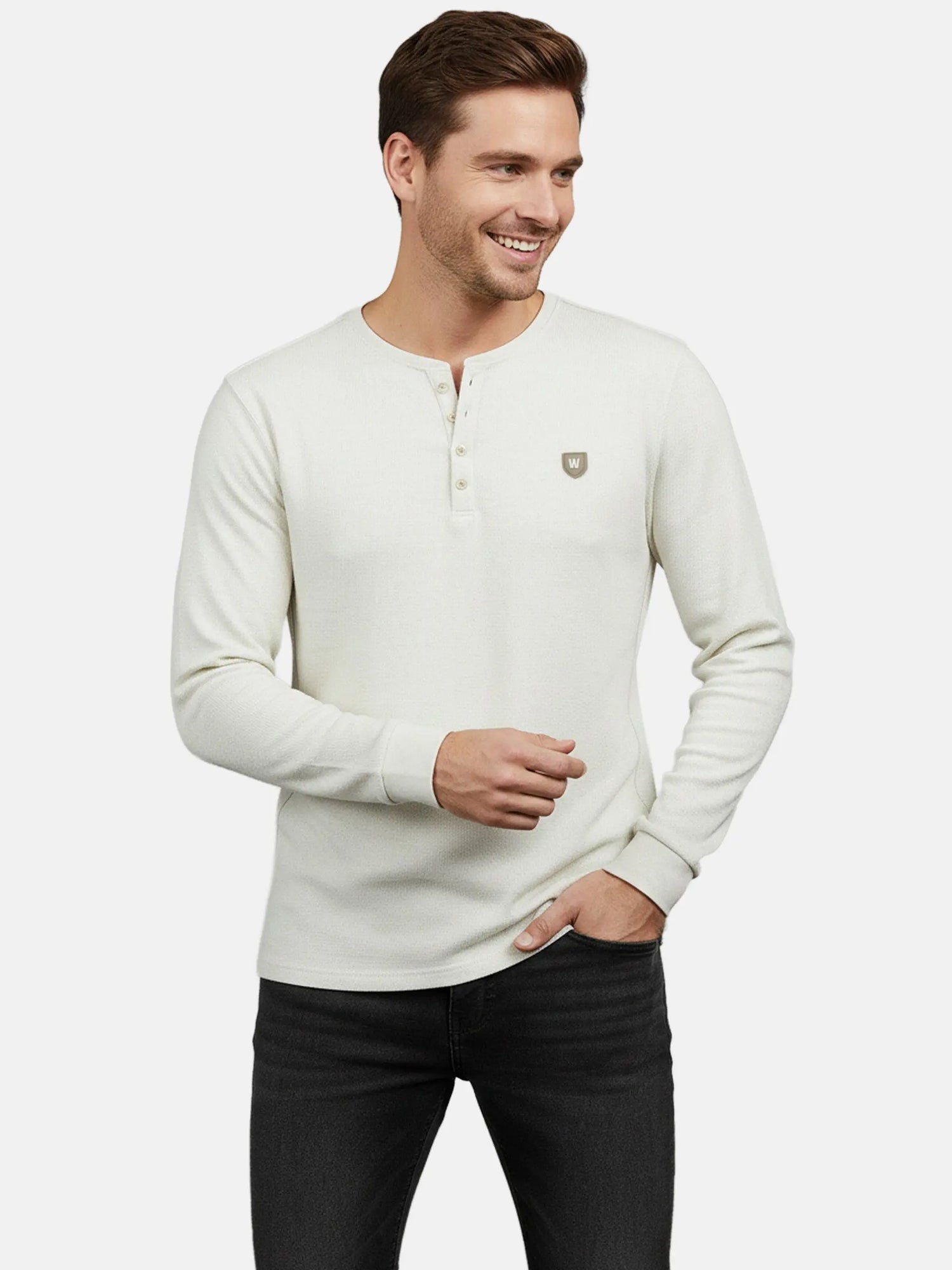 Close-up of model wearing off-white long-sleeve sweate.