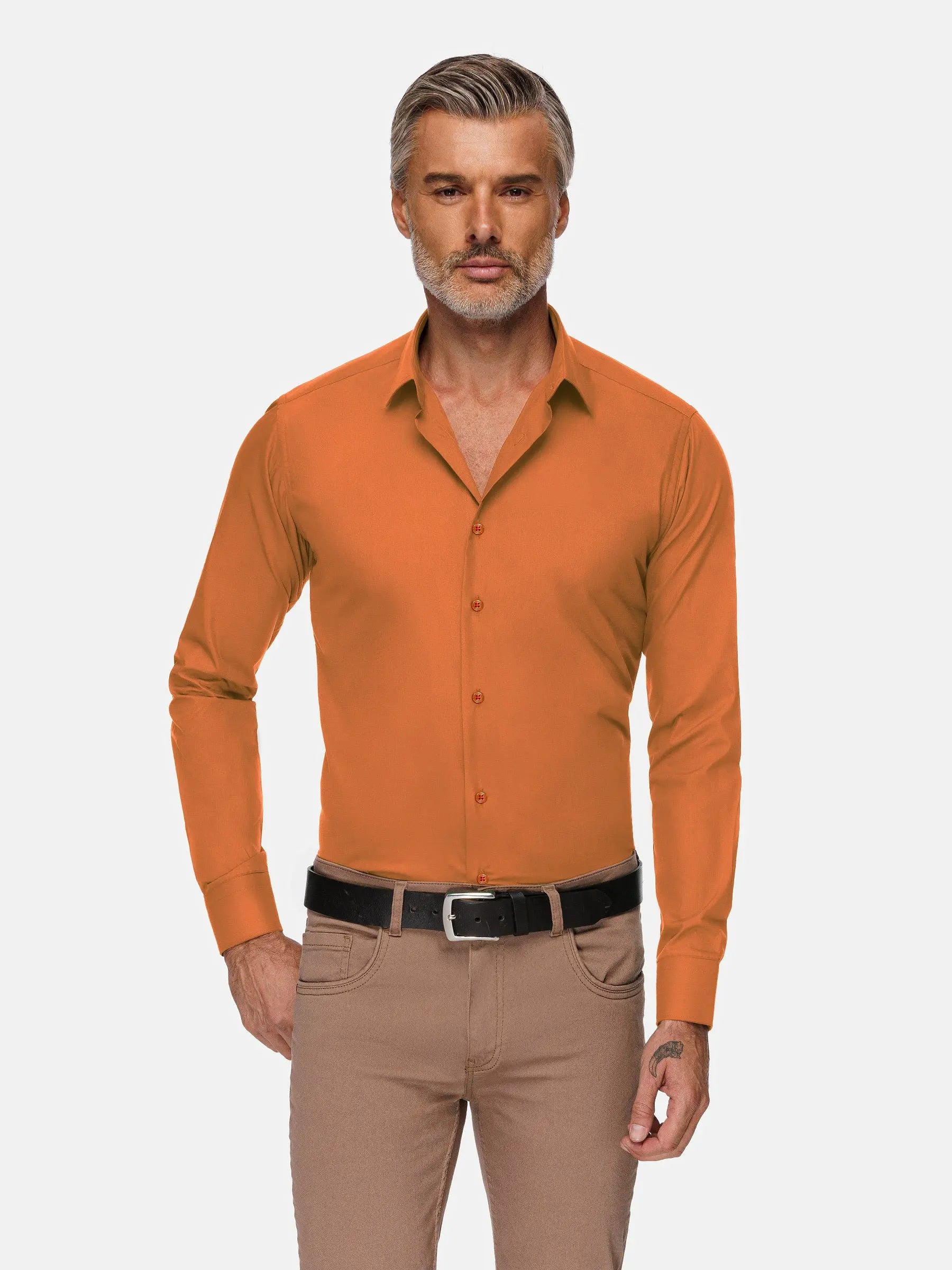 Model wearing slim-fit orange long sleeve dress shirt styled with beige pants – Wam Denim.