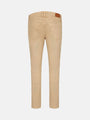 Back view of **beige** men's **slim fit jeans** with back pockets – Wam Denim.