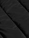 
Close-up texture of the black puffer jacket's quilted nylon fabric – Wam Denim.