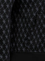 Close-up of black patterned hoodie pocket with stitched geometric design and ribbed hem – Wam Denim.