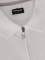 Close-up of the zipper and collar on the white zip polo shirt – Wam Denim.