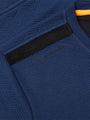 Close-up of navy Moorland Sweater with logo patch. – Wam Denim.