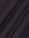Close-up of black textured knit fabric showcasing fine weave and smooth finish – Wam Denim.