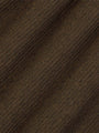 Close-up texture of diagonally ribbed knit fabric – Wam Denim.