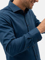 Close-up of petrol blue men’s shirt showing collar, buttons, and smooth premium fabric.