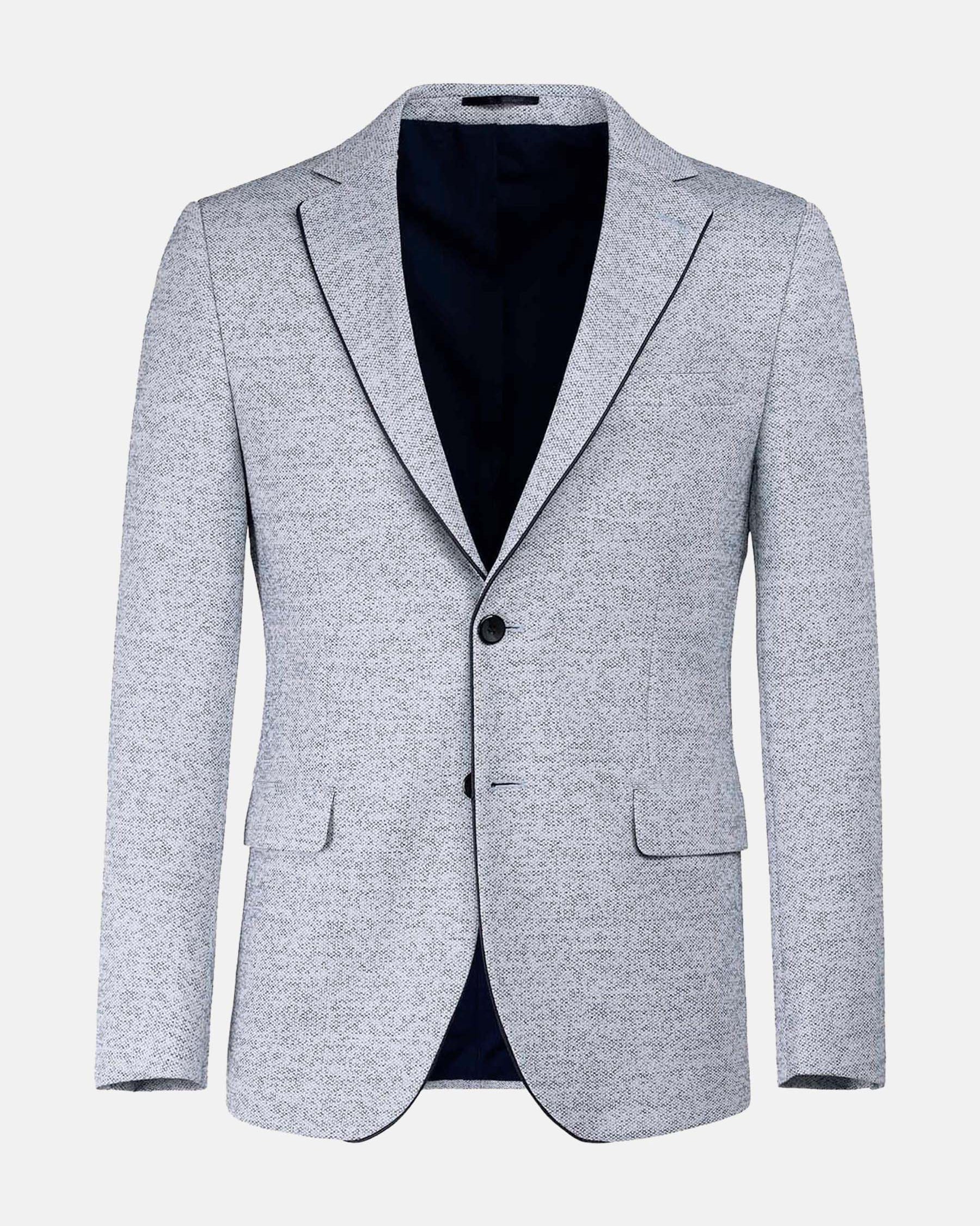 Light white-navy textured blazer with two buttons and notch lapels, modern menswear style.