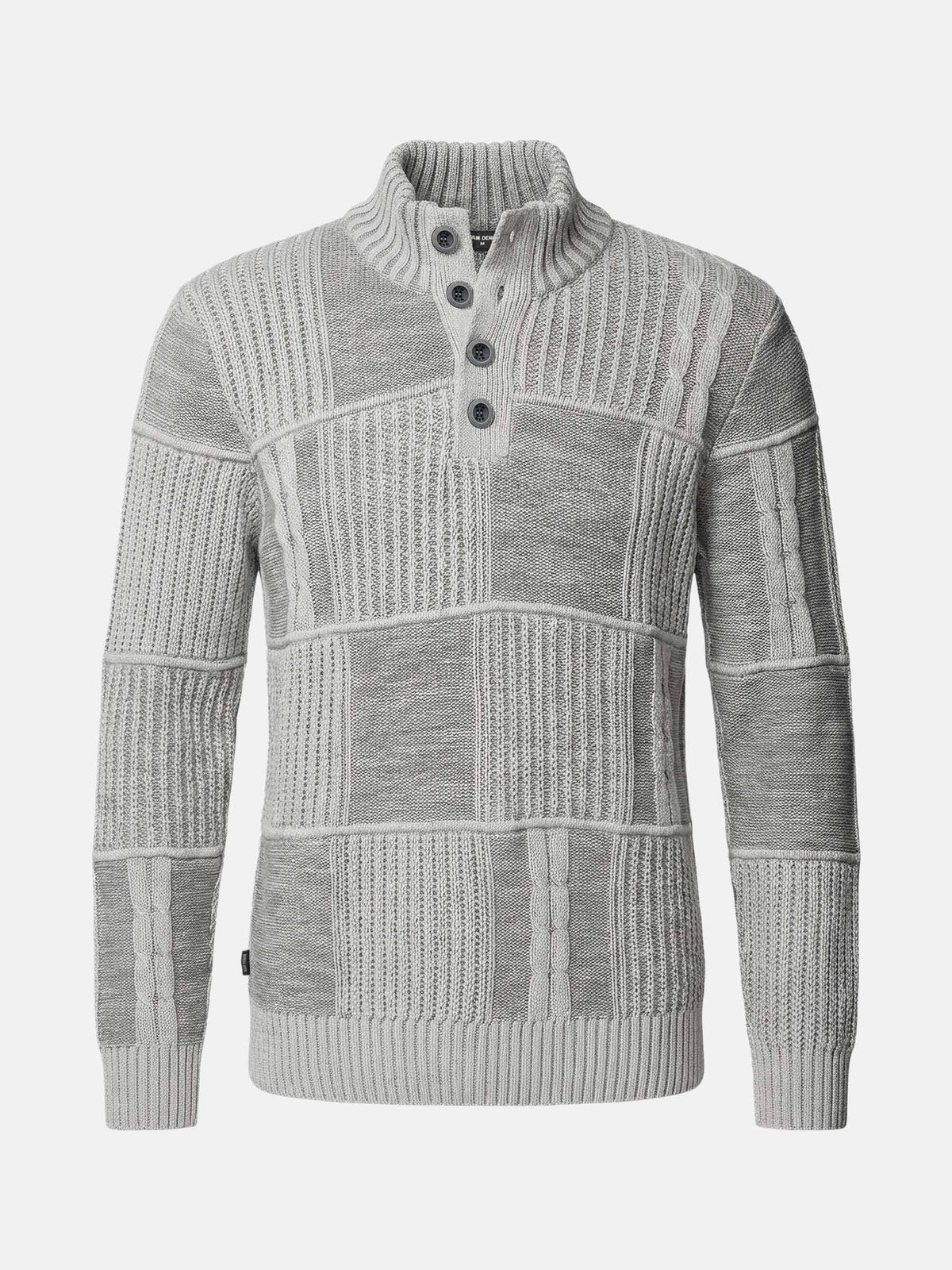 Light grey men’s knitwear sweater with textured patchwork design and buttoned high collar.