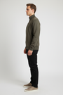 Side view of a male model wearing the Wam Denim Shrap khaki pullover