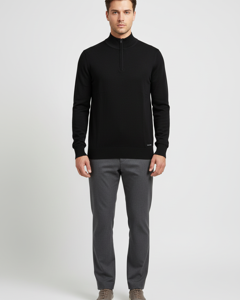 Male model wearing the Wam Denim Halron black quarter-zip knit sweater, front view