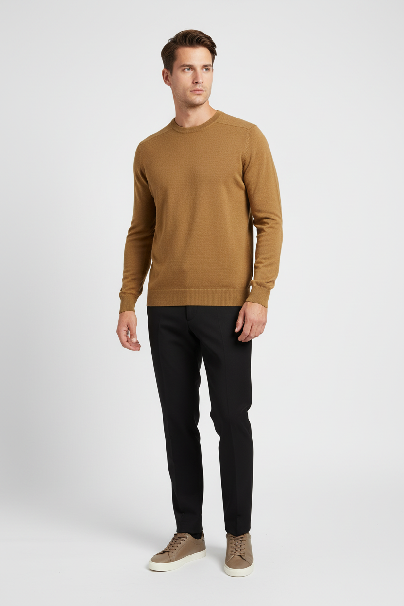 Male model wearing a dark-yellow crew-neck sweater in a three-quarter view