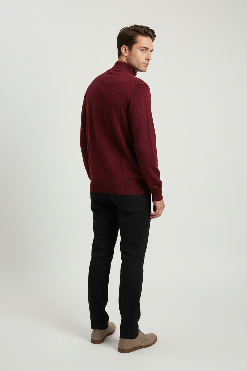 Back view of a male model wearing the Lux dark-red sweater with Wam Denim neck branding