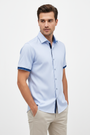 Wam Denim Seldor Blue Short Sleeve Shirt – three-quarter view on model, casual style