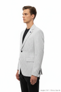 Side profile - white textured blazer on model