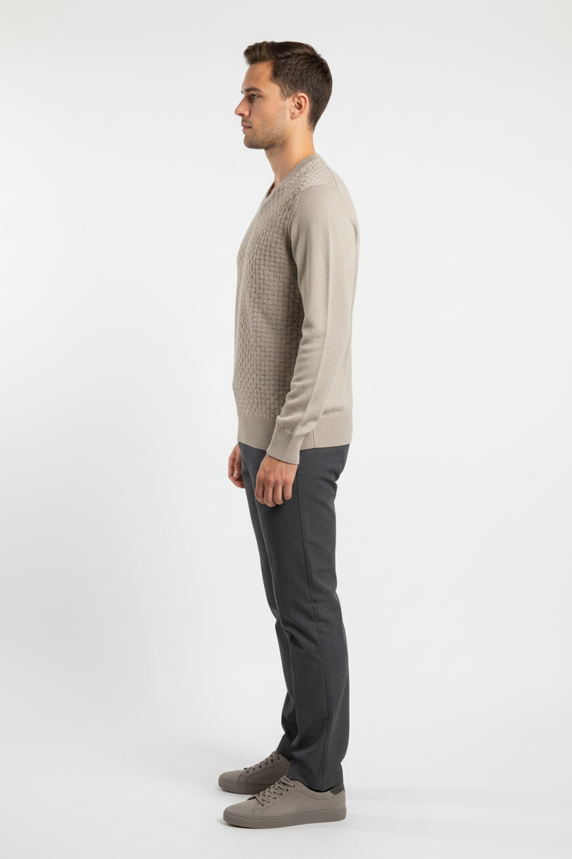 Side view of a male model wearing the Wam Denim Forge beige V-neck sweater