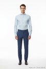 Full body front - light blue shirt first button open