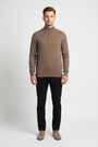Male model wearing a Wam Denim brown quarter-zip knit sweater, front view