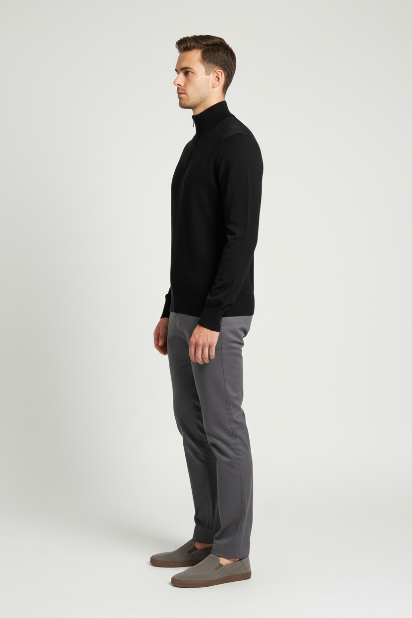 Side view of a male model wearing the Wam Denim Sharp black quarter-zip sweater