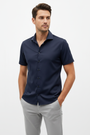 Wam Denim Lorven Navy Short Sleeve Shirt – three-quarter view on model, casual style