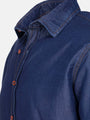 Close-up of navy men’s shirt collar with contrast stitching and buttons