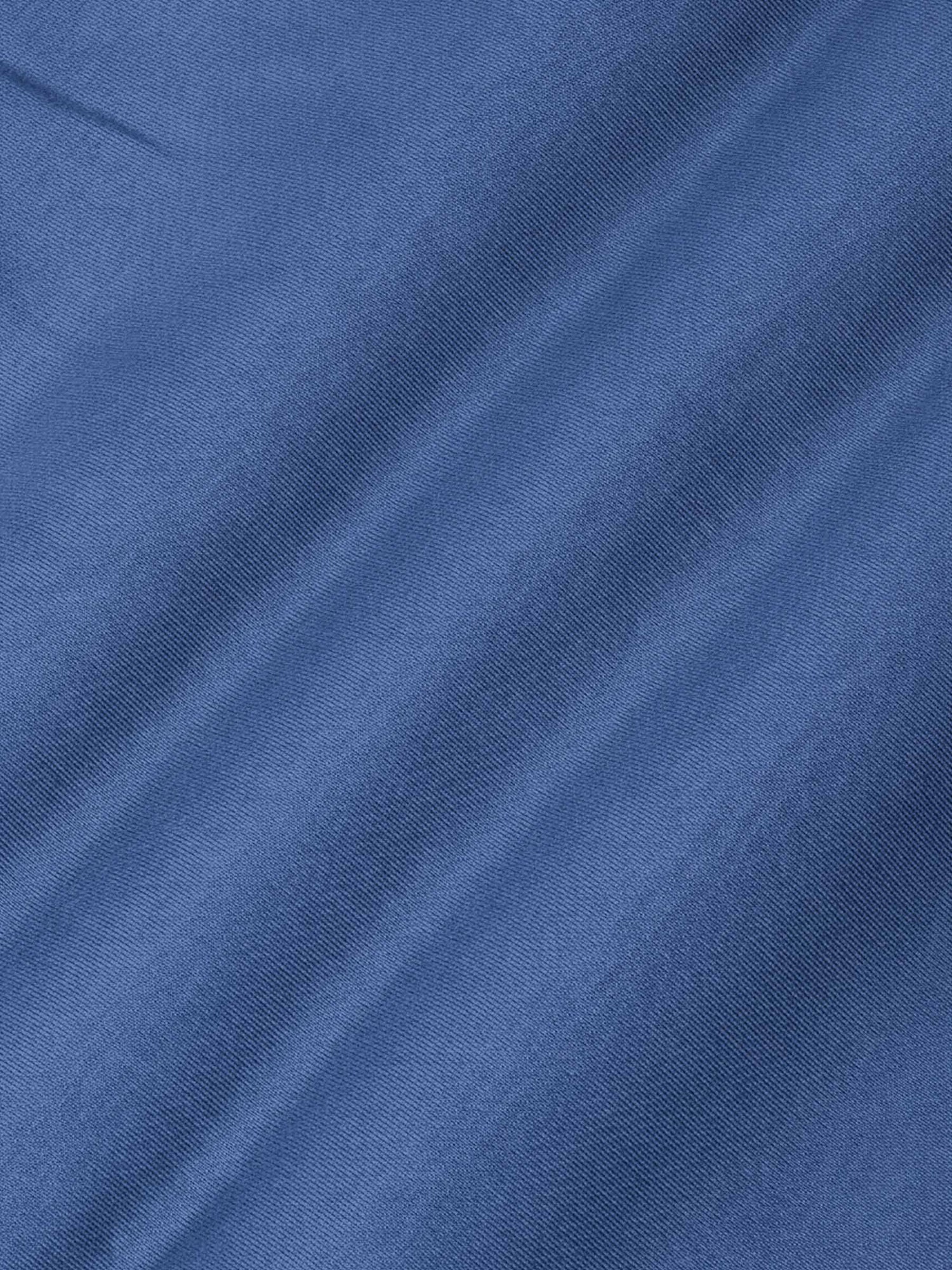 Close-up of indigo fabric texture from the Prime Indigo sweater.