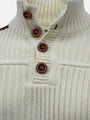 Close-up of off-white knit sweater showing ribbed texture and brown button-neck detail.