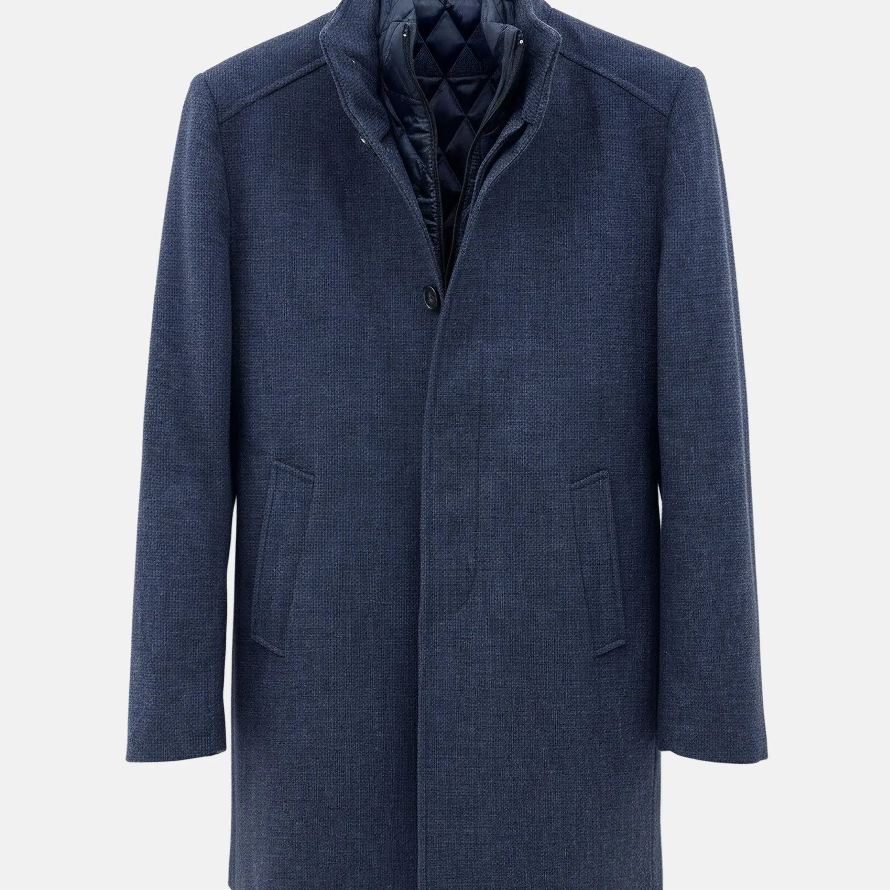 Light navy men’s trenchcoat with quilted inner lining and front button closure for winter.