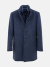 Light navy men’s trenchcoat with quilted inner lining and front button closure for winter.