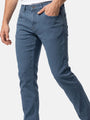 Close-up of slim fit blue men’s stretch denim jeans.